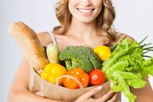 Woman Holding Healthy Food