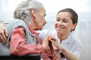 Hospice employee taking care of the patient