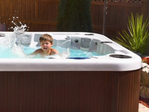 Little boy in a hot tub