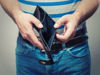 Man showing his empty wallet