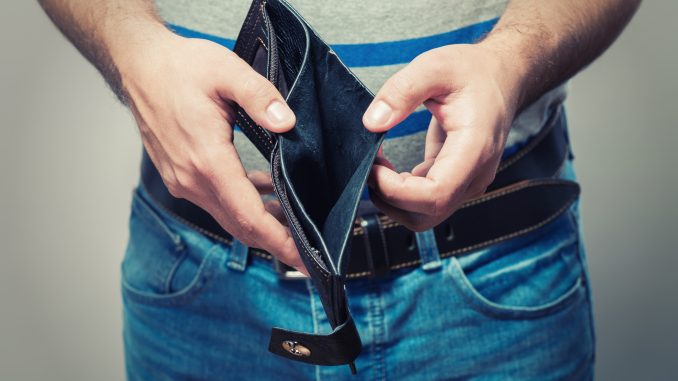 Man showing his empty wallet Man showing his empty wallet