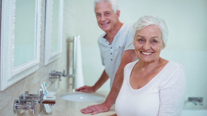 Elderly couple in a bathroom Elderly couple in a bathroom
