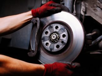A car's brakes being repaired