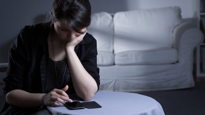 Lonely woman after divorce spending evening alone Lonely woman after divorce spending evening alone