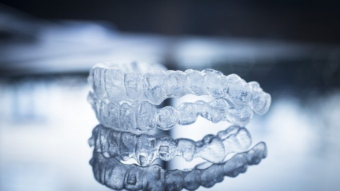 A pair of Invisalign braces A pair of Invisalign braces