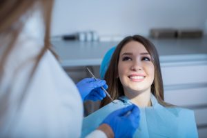 Woman speaking with dentist on a dental clinic