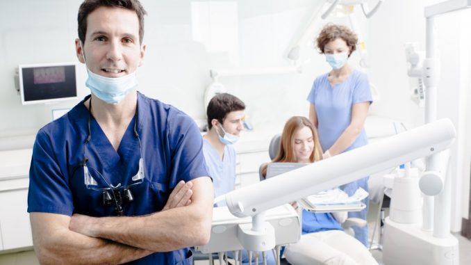 Dentist in dental clinic Dentist in dental clinic