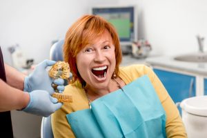 Woman with new dental implants