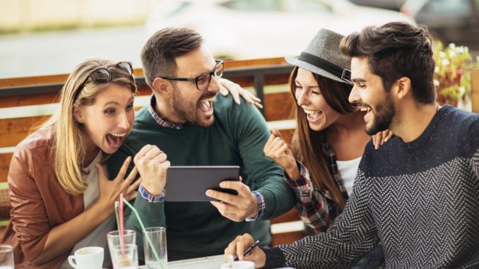 Friends having fun with a smartphone Friends having fun with a smartphone