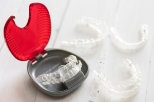 invisalign in a red case