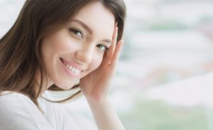 Woman with clear skin smiling