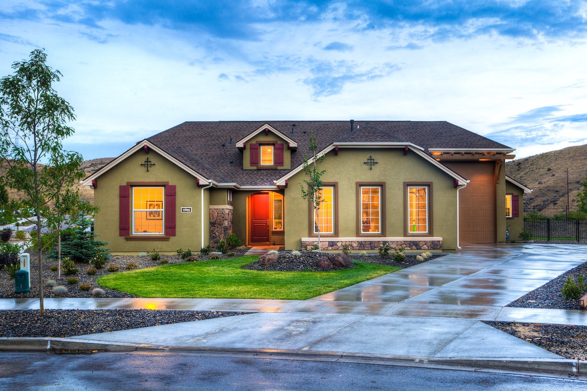 home exterior with small tree