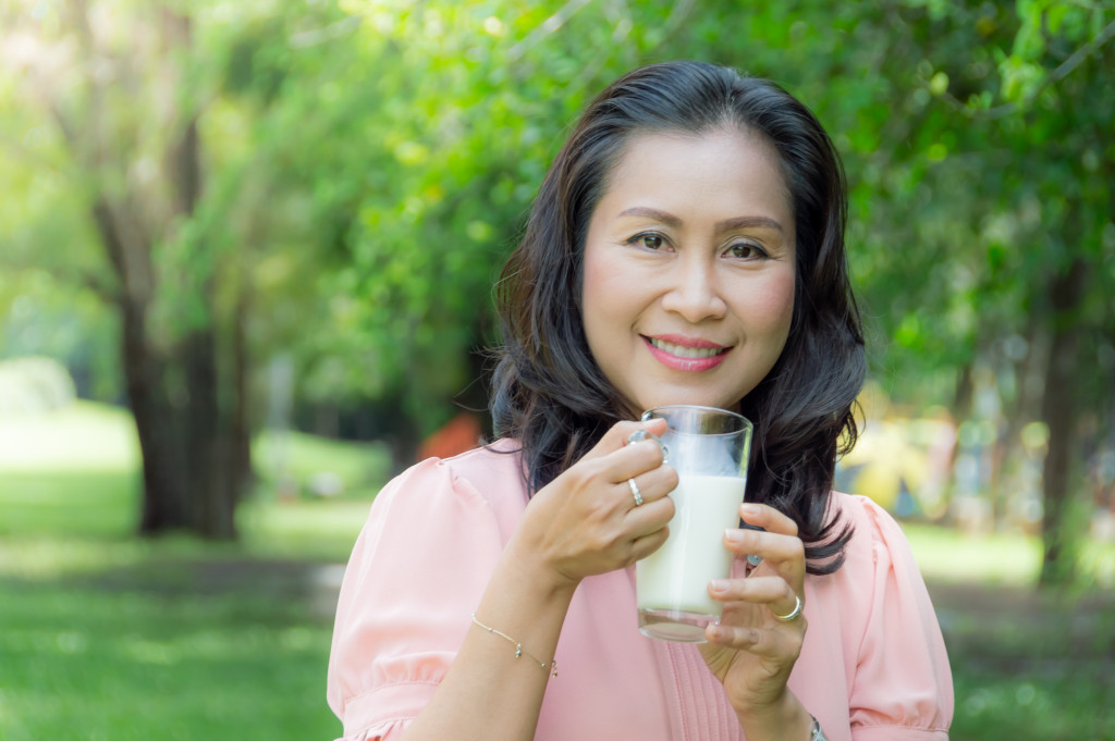 a woman drinking milk
