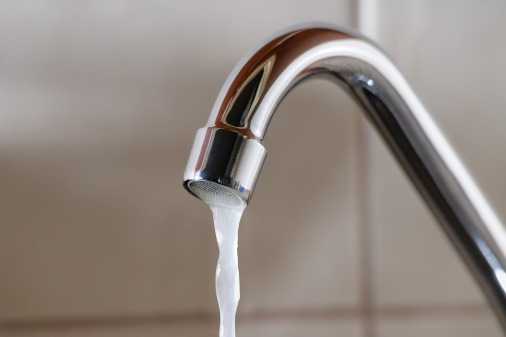 Water flowing from a tap