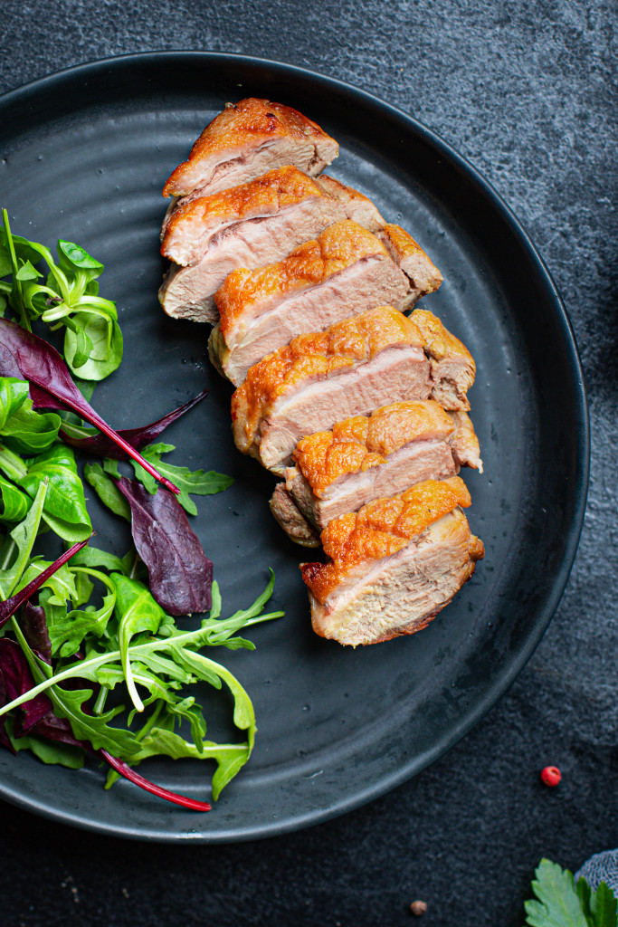 Fried duck breast with salad