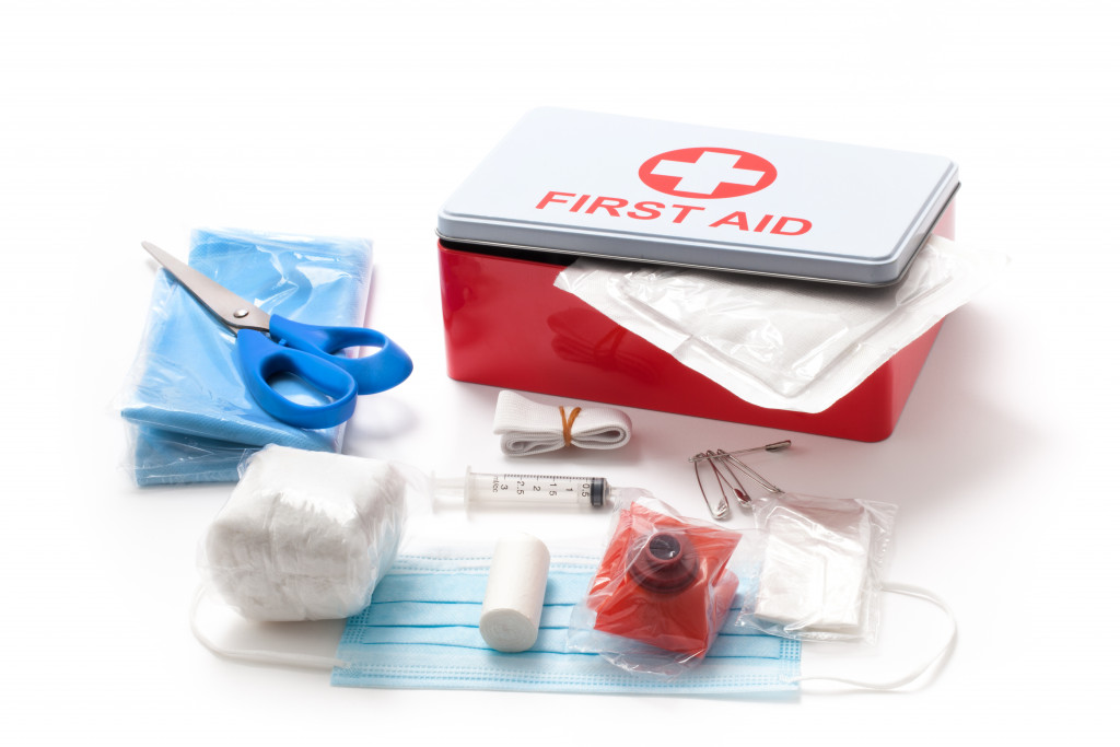 First-aid kit with emergency supplies placed outside.